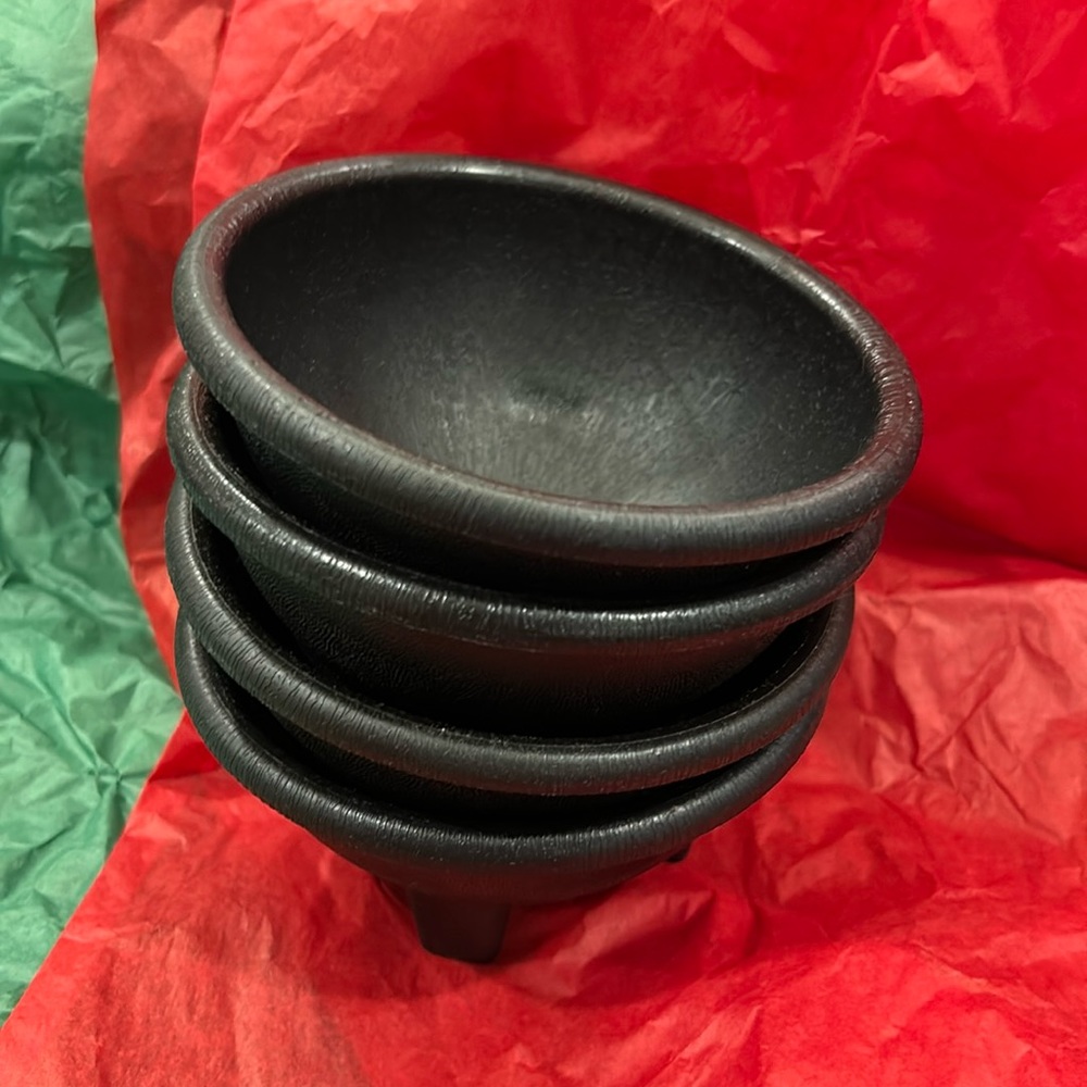 Four black salsa bowls